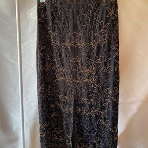 Black and gold beaded skirt.